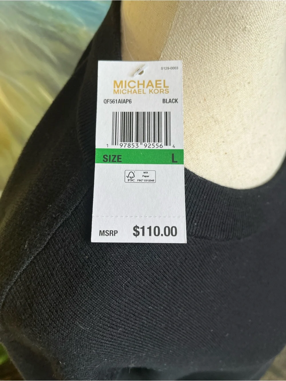 New w/tags, Michael Kors top w/silky shirt tail in black. Size L w/gold logo.